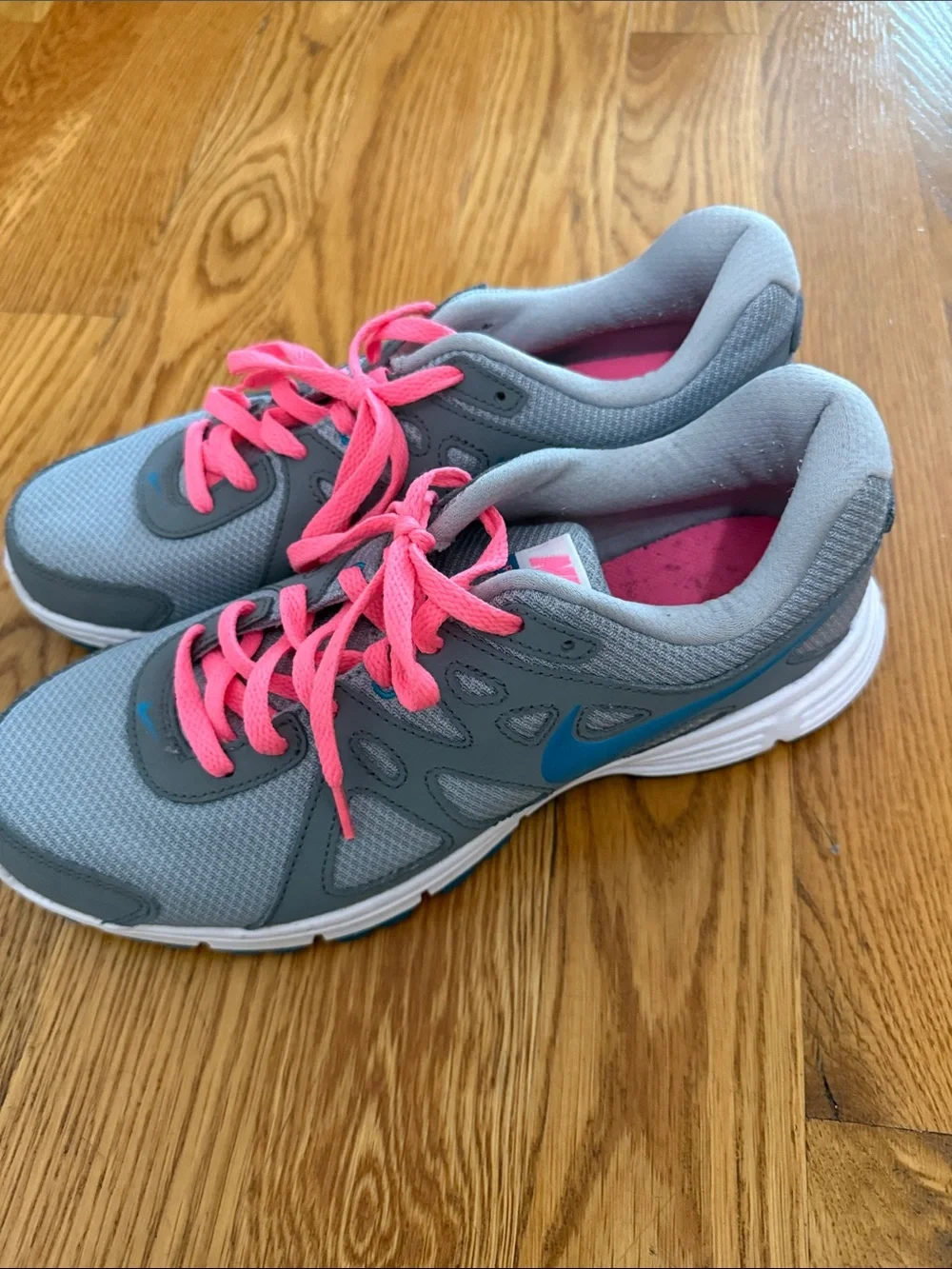 Nike Women's Gray Athletic Sneakers with Pink Laces and Blue Swoosh